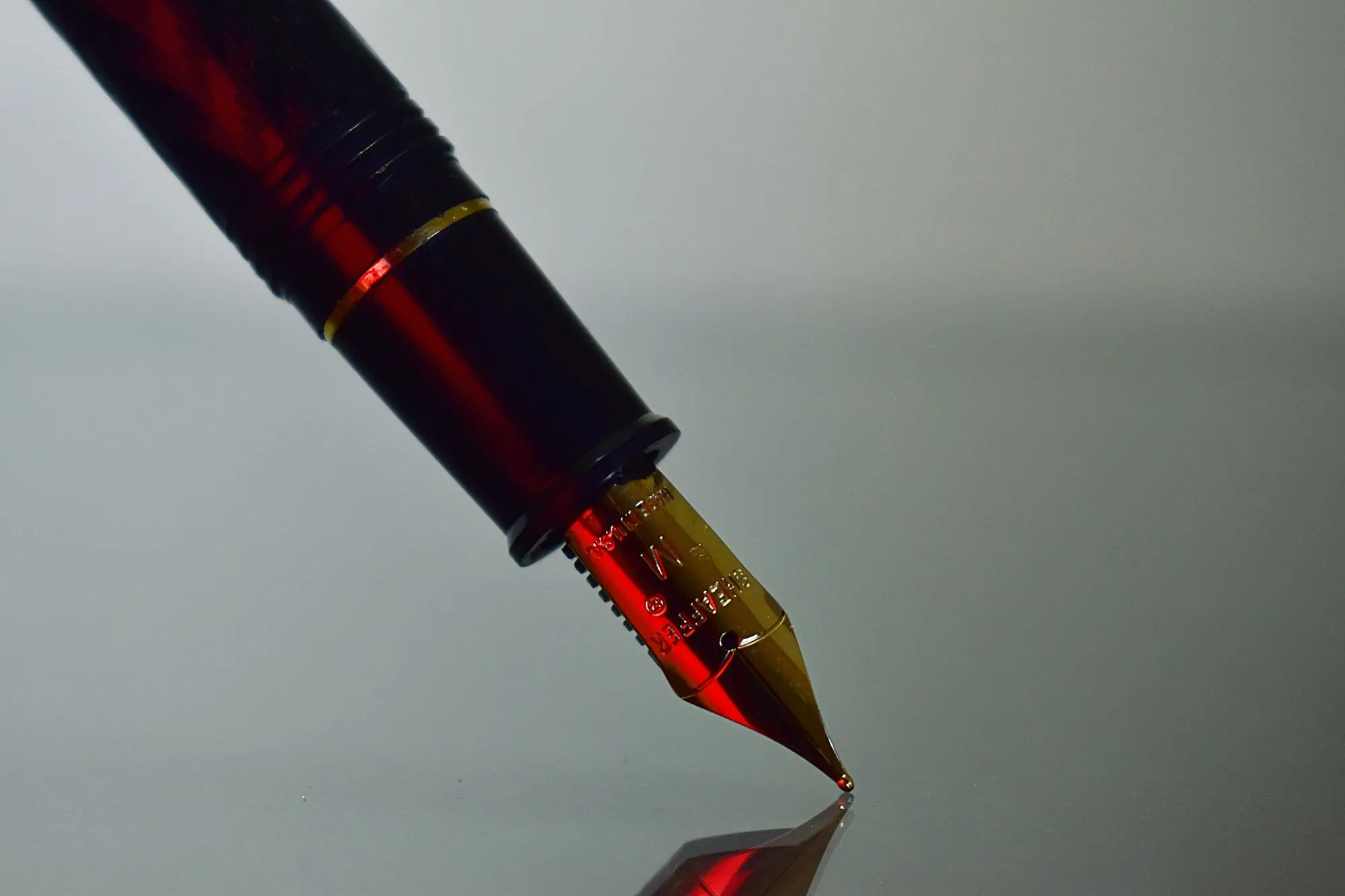 Fountain pen resting on paper, ready to sign a business loan contract